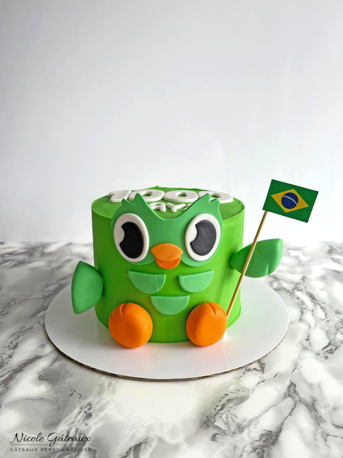 Gâteau chouette Duolingo avec drapeau du Brésil